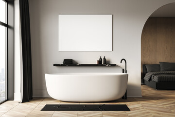 Modern luxury bathroom interior with white bathtub, black faucet, wooden floor and blank canvas frame on wall for poster or banner mockup display. 3D Rendering