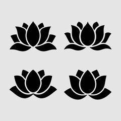 Four black lotus flower silhouettes isolated on white background