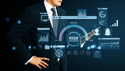 Businessman using smartphone for risk management with financial graphs and digital interface on dark background representing fintech and control.