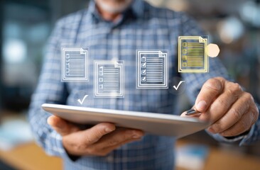 Senior man using tablet with checklist icons