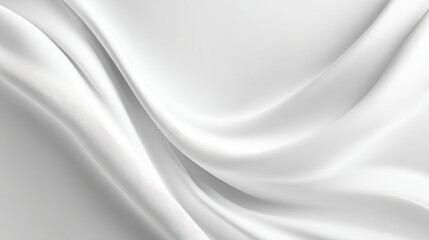 Delicate white fabric flows gracefully over a flat surface, highlighting its smooth texture and natural sheen in soft, diffused light that enhances its elegance.