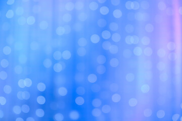 blurred focus of decorative lights in blue background