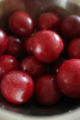 red plum fresh closed up high quality