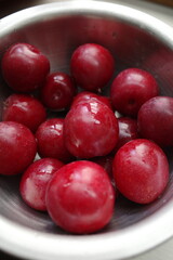 red plum fresh closed up high quality