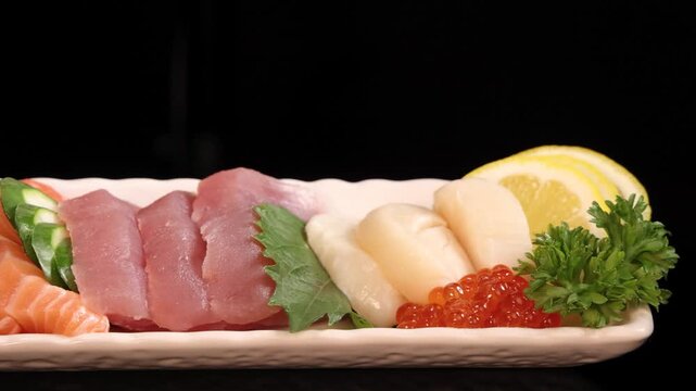 Rotating Platter of Salmon, Tuna, Scallop, and Roe Sashimi