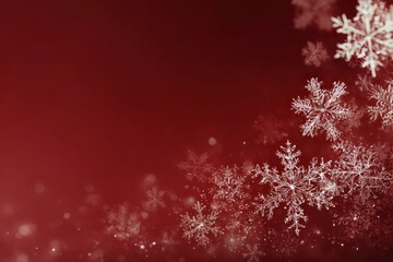 White snowflakes gently cascade against a dark red gradient background. Perfect for holiday cards, winter promotions, or seasonal designs.