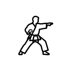 Martial arts practitioner performing kick pose in martial arts uniform