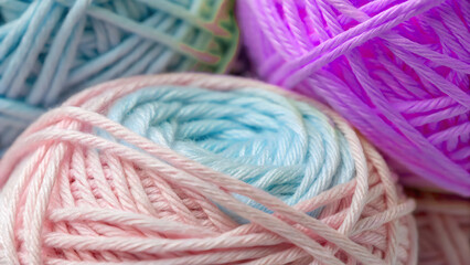 Colourful balls of yarn and thread showcase a vibrant texture for knitting and craft projects