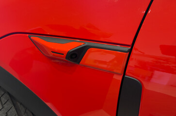 Rear view camera cover. Surround view 360 degrees camera. Parking assistant and car help systems. Modern car exterior details