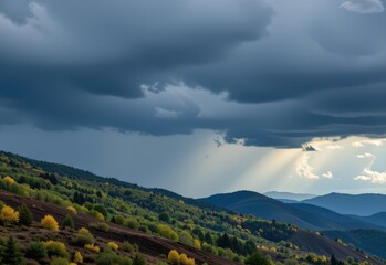 Fototapeta premium storm clouds moving upward along hill triggering rainfall pattern influenced by rising terrain below