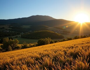 shadow cast by hill delaying morning sun in valley causing longer cool period for lowland crops