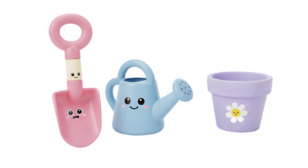 Pink toy shovel, blue watering can, and purple flower pot with smiley faces on white background