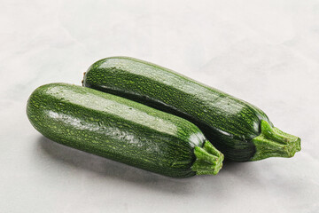 Raw green ripe zucchini vegetable