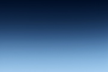 Obraz premium Blue gradient background fading from dark navy at top to light sky blue at bottom in abstract style