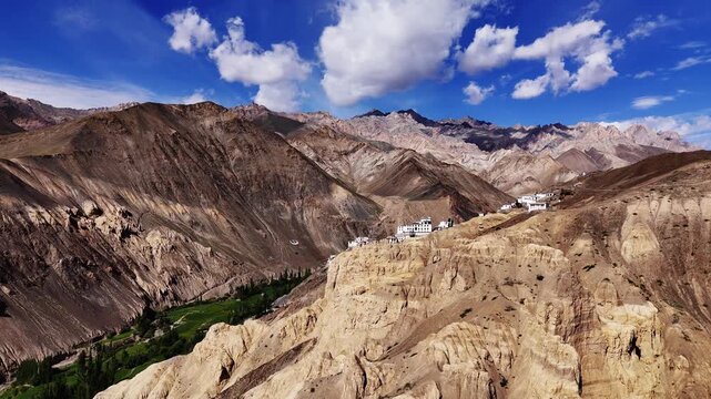 Lamaruru monastery over moon land landscape and visor blue sky aerial dynamic fly over.