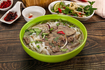 Vietnamese Pho Bo soup with beef and noodles