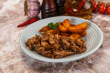 Baked shredded pork with potato