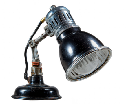 Vintage articulated desk lamp with black metal shade and chrome accents isolated on transparent background