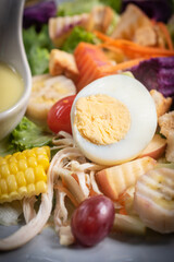 Close up capturing delectable salad featuring crisp croutons on rustic wooden table
