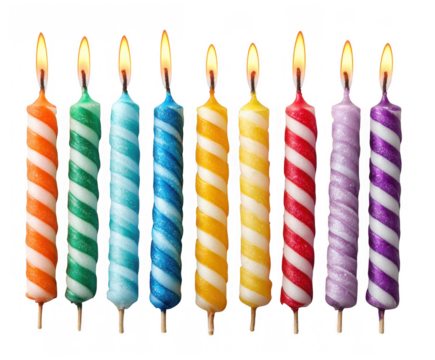 Colorful spiral birthday candles with lit wicks isolated on transparent background