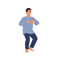 Man in blue shirt and pants performing a tai chi pose with hands on his chest.