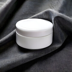 A white cosmetic jar placed on a textured fabric surface.