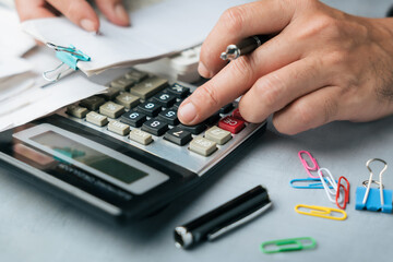 Calculating Bill Amount with Calculator and Documents