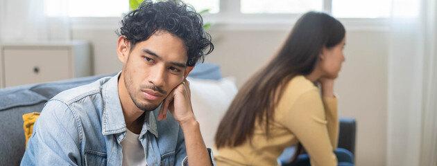 Family problem concept. Tension in relationship between married couple, husband and wife staying...