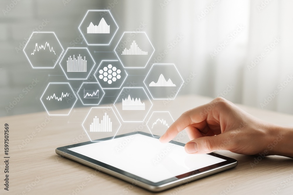 Poster hand interacting with digital tablet displaying futuristic data analytics interface on light backgro