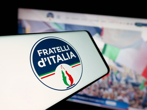 Stuttgart, Germany - 07-11-2025: Smartphone with logo of Italian party Fratelli d'Italia (FDL) on screen in front of website. Focus on center of phone display.