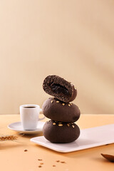 Chocolate sandwich bread and coffee, brown desktop background