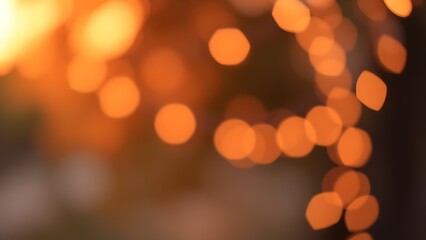 Soft, glowing lights in warm sunset hues create a dreamy and romantic outdoor atmosphere.