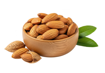 Wooden bowl filled with almonds and green leaves on image