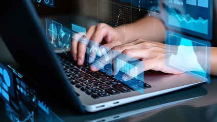 Hands typing on laptop with digital data overlays showing information technology and business intelligence solutions for success