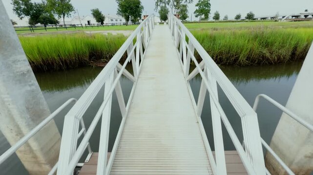 4K slow motion at Riverfront Park, North Charleston, SC. iPhone 16 Pro Max on DJI Osmo captures lush green nature. Smooth, cinematic push-pan reveals vibrant landscape. 60fps slowed to 24fps.