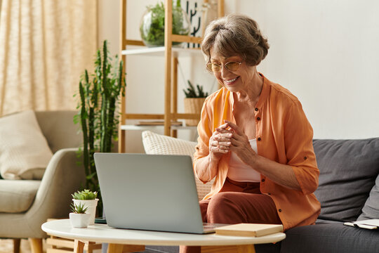 Joyful senior woman connecting with loved ones in her cozy home setting - Powered by Adobe