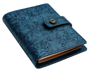 Elegant blue textured notebook with embossed pattern and snap closure isolated on transparent background