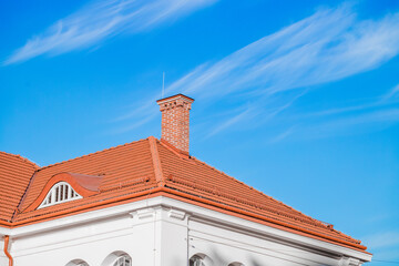 cottage living building with roof tile and chimney on blue sky background space