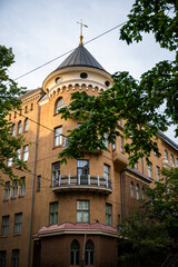 Historic residential building with turret and round balcony in Helsinki, Finland