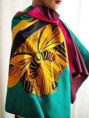 Fototapeta premium Vibrant Silk Scarf with Abstract Butterfly Design