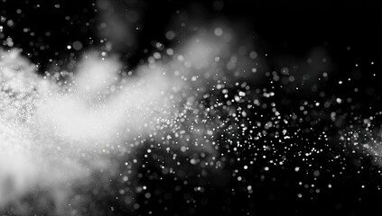 Abstract particles exploding on a black background