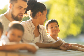 Happy family enjoying time together outdoors in a park