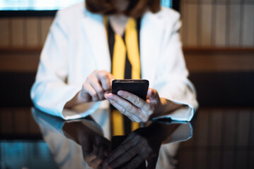 Bsiness woman sitting front tablet ,laptop computer with financial graphs and statistics