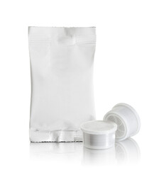 Wrapper with capsules for extracting hot drinks from automatic machines, outlined on white