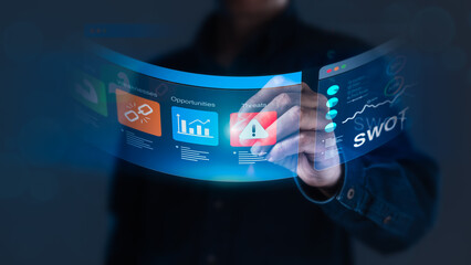 Businessperson Interacting with Flexible Screen for SWOT Analysis