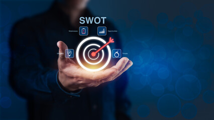 SWOT Analysis Target with Businessperson Hand - Strategic Planning and Goal Achievement