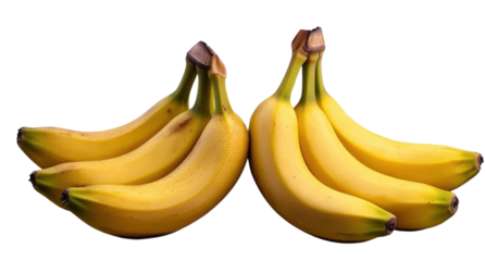 bananas, two bunches of ripe yellow fruit isolated on black.