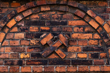 Nikiszowiec Ornamental Mining Shield Motif on Brick Wall