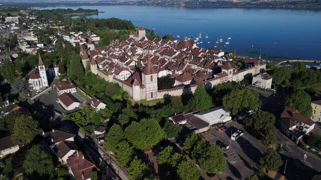 Murten Switzerland medieval town establishing shot aerial drone Morat Fribourg region