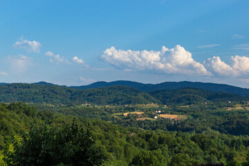Obraz premium Clouds over low mountains, Balkan landscape